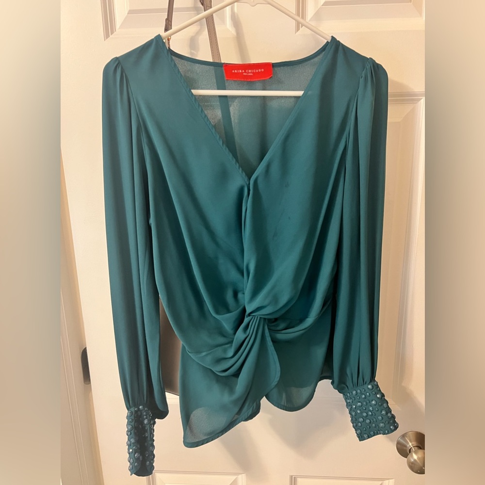 Emerald green blouse with jeweled sleeves